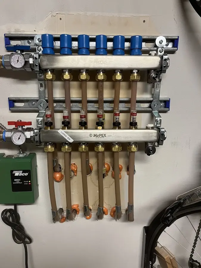 Plumber performing Gas Leak Detection at a residential property in Plainview